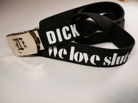 Dick belt. 70 inch long woven web belt with silver buckle and metal tips. Reversible Dirty Futon Girl logo and We Love Sluts screenprint.