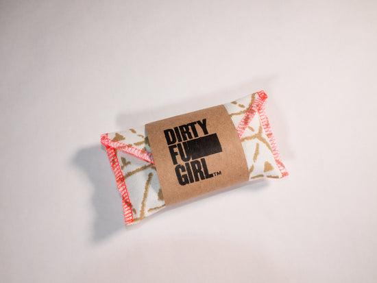 The Slut Kit by Dirty Futon Girl features Skyn™ latex free condoms, Sliquid™ organic silk lube sachets, Fresh By Kit™ all natural cleansing wipes, and Pearly Wipes™ teeth wipes so you can have safe sex anytime, anywhere.